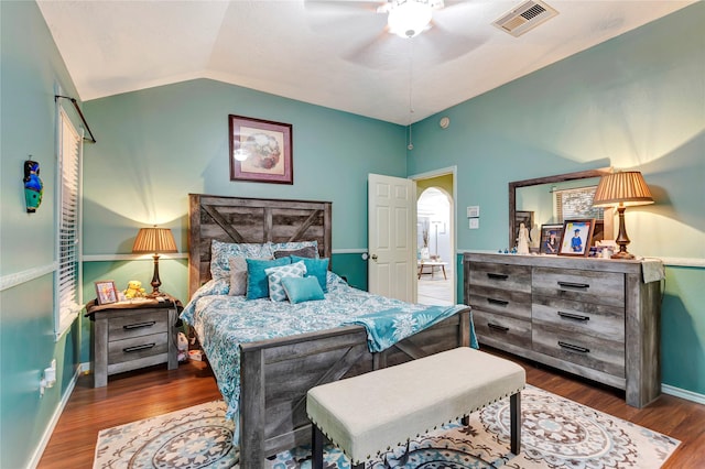 394 Sherandoe Ln, Alvin, TX 77511 - bedroom with vaulted ceiling, wood finished floors, a ceiling fan, and arched walkways
