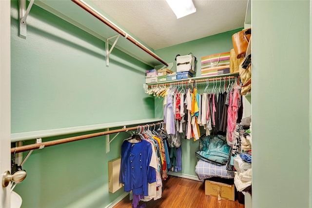 394 Sherandoe Ln, Alvin, TX 77511 - walk in closet featuring wood finished floors