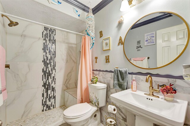 394 Sherandoe Ln, Alvin, TX 77511 - full bathroom with tile walls, tiled shower, and wainscoting