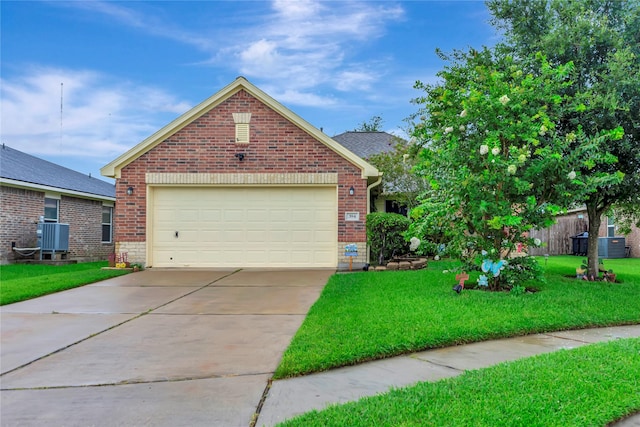 394 Sherandoe Ln, Alvin, TX 77511 - view of front of property featuring brick siding, a front lawn, driveway, and a garage
