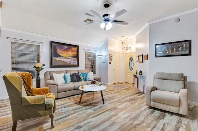 394 Sherandoe Ln, Alvin, TX 77511 - living area featuring ornamental molding, light wood finished floors, a chandelier, ceiling fan, and vaulted ceiling