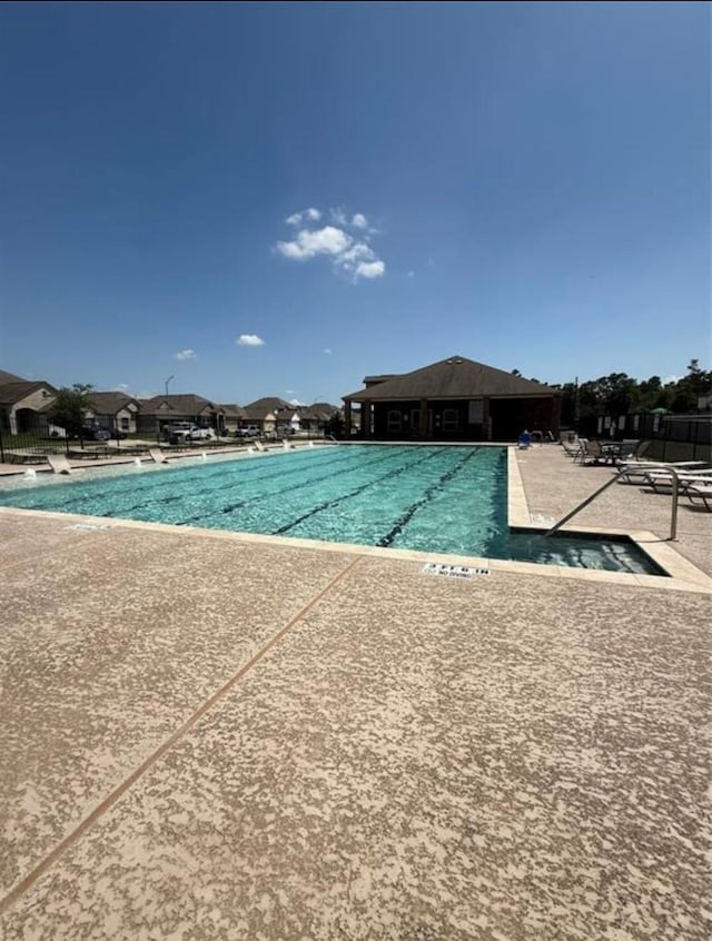 17531 Cuthbert St, Humble, TX 77346 - community pool with a patio area
