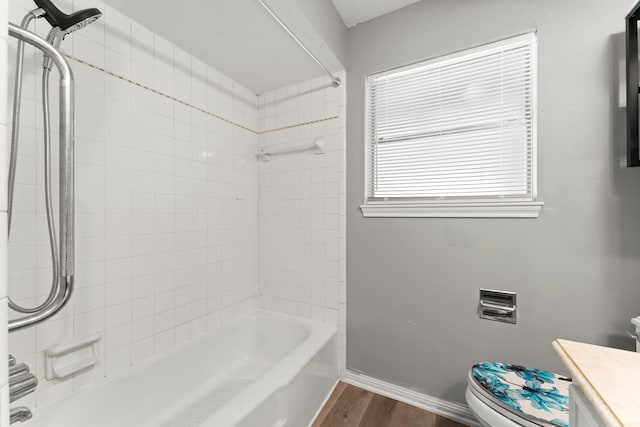 16310 Autumn Wind Dr, Houston, TX 77090 - bathroom with vanity, wood finished floors, and bathing tub / shower combination