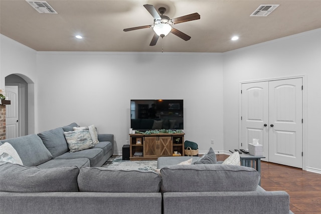 4202 Carnes Ct S, College Station, TX 77845 - living room with arched walkways, a ceiling fan, dark wood-style flooring, and recessed lighting