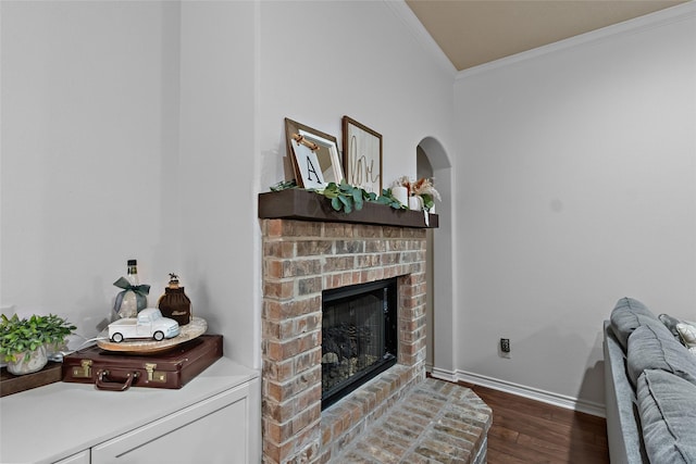 4202 Carnes Ct S, College Station, TX 77845 - living area featuring crown molding, dark wood finished floors, and a brick fireplace