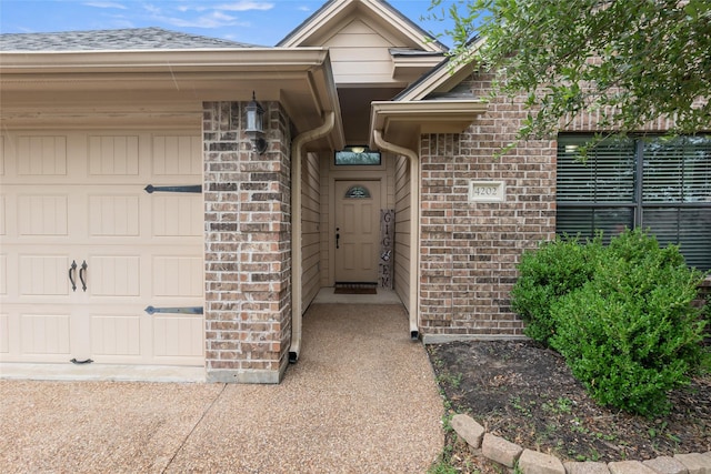 4202 Carnes Ct S, College Station, TX 77845 - entrance to property featuring an attached garage and brick siding