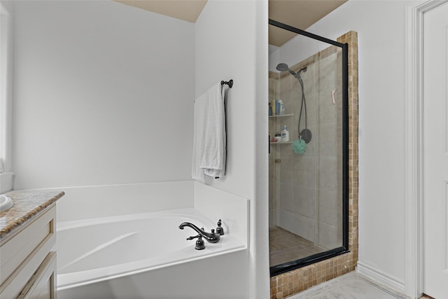 4202 Carnes Ct S, College Station, TX 77845 - bathroom with a shower stall, a garden tub, and vanity