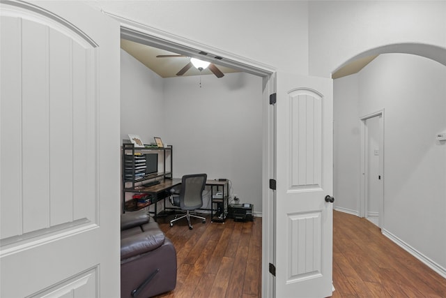 4202 Carnes Ct S, College Station, TX 77845 - home office featuring dark wood-type flooring, a ceiling fan, and arched walkways