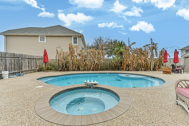 12811 E Conquistador, Galveston, TX 77554 - view of pool with an in-ground hot tub, a fenced backyard, and a patio area