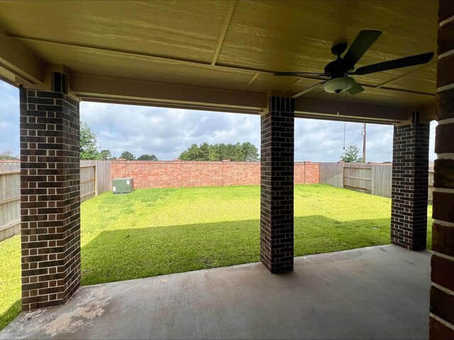 3056 Myrtle Sunset Dr, Katy, TX 77493 - fenced backyard with a patio and a ceiling fan