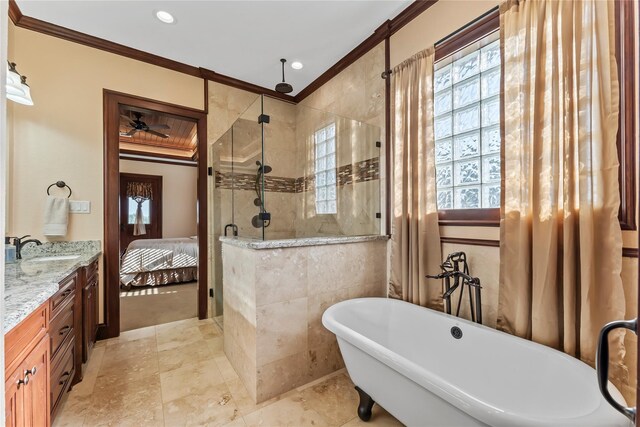 2830 Airport Rd, Brenham, TX 77833 - ensuite bathroom with a stall shower, a freestanding bath, crown molding, and vanity