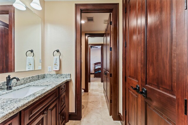2830 Airport Rd, Brenham, TX 77833 - bathroom with vanity and tile patterned flooring
