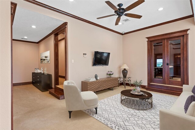 2830 Airport Rd, Brenham, TX 77833 - living area featuring recessed lighting, a ceiling fan, ornamental molding, and light colored carpet