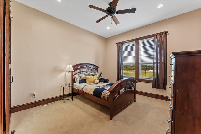 2830 Airport Rd, Brenham, TX 77833 - bedroom with light colored carpet, recessed lighting, and ceiling fan
