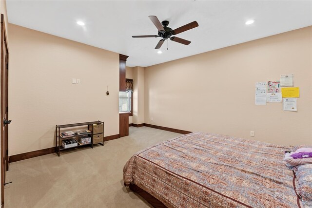 2830 Airport Rd, Brenham, TX 77833 - bedroom with light colored carpet, recessed lighting, and a ceiling fan