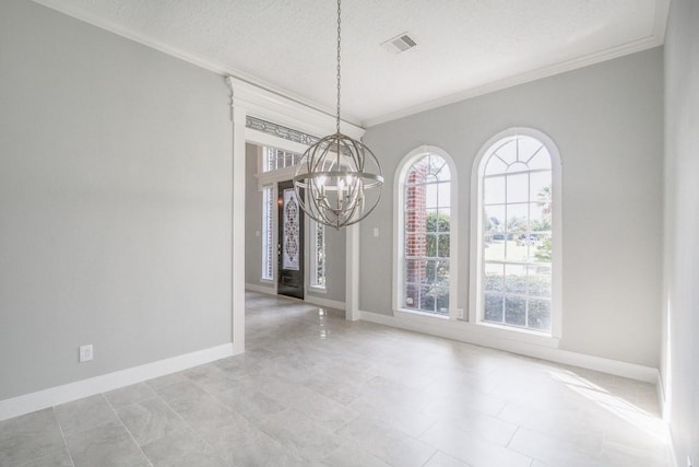 6302 Laver Love Dr, Spring, TX 77379 - unfurnished dining area featuring a chandelier, ornamental molding, plenty of natural light, and a textured ceiling