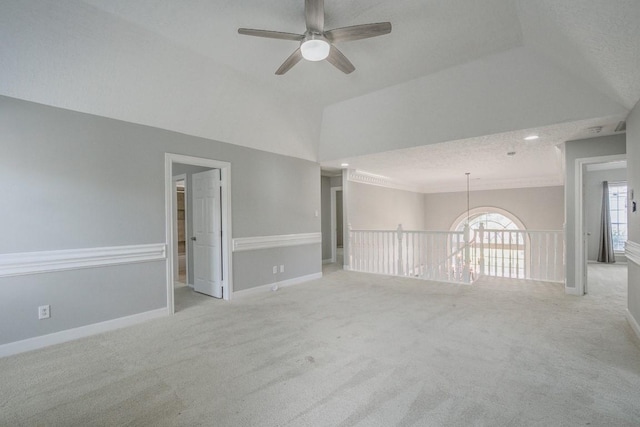 6302 Laver Love Dr, Spring, TX 77379 - unfurnished room featuring ceiling fan, vaulted ceiling, carpet flooring, and crown molding