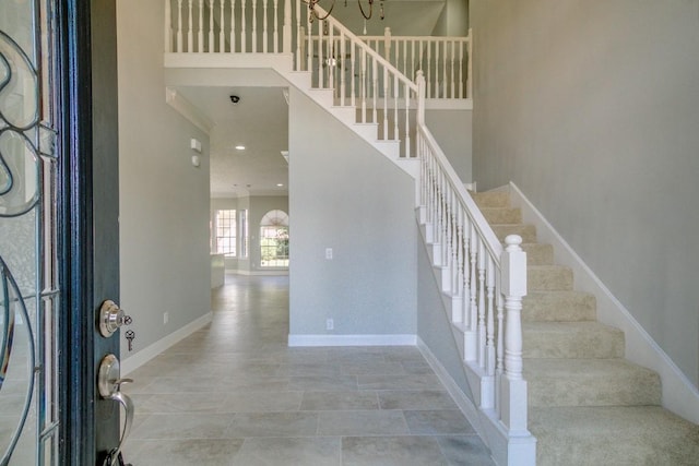 6302 Laver Love Dr, Spring, TX 77379 - foyer with stairs and a chandelier