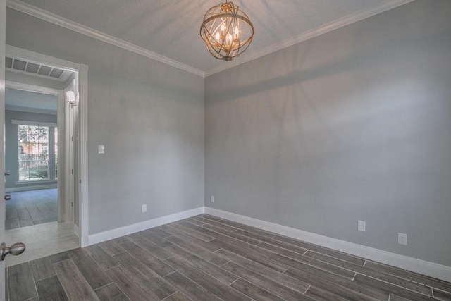 6302 Laver Love Dr, Spring, TX 77379 - spare room with a chandelier, wood finish floors, and crown molding