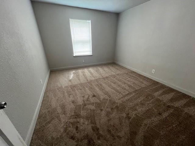 2227 Westway St, Orange, TX 77630 - carpeted empty room with baseboards