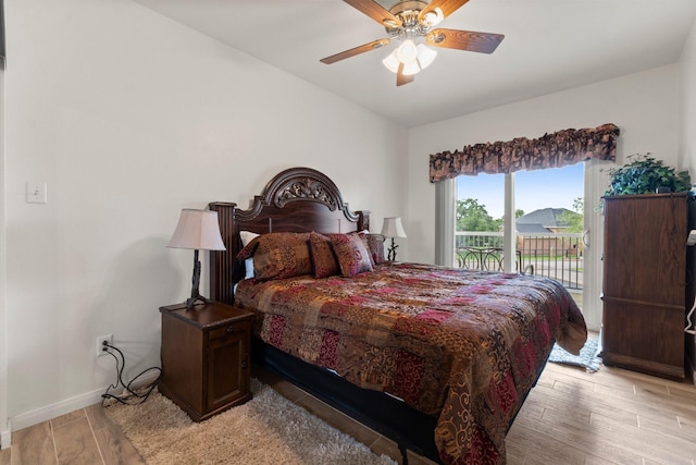 12800 Melville Dr Unit B207, Montgomery, TX 77356 - bedroom featuring access to outside, light wood finished floors, and ceiling fan