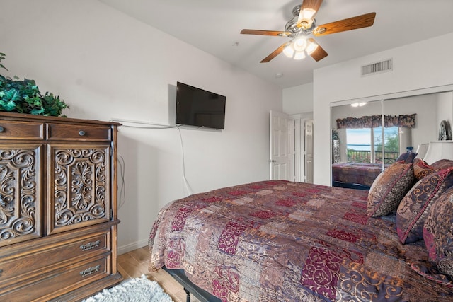 12800 Melville Dr Unit B207, Montgomery, TX 77356 - bedroom featuring wood finished floors, a ceiling fan, and access to exterior