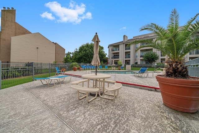 12800 Melville Dr Unit B207, Montgomery, TX 77356 - view of patio with a community pool