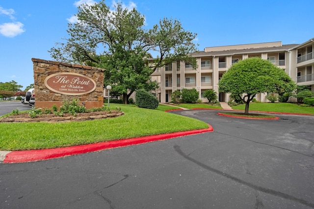 12800 Melville Dr Unit B207, Montgomery, TX 77356 - community / neighborhood sign featuring uncovered parking and a lawn
