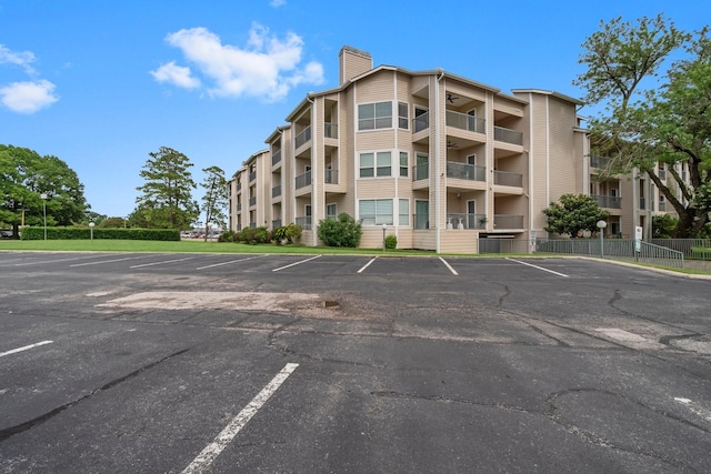 12800 Melville Dr Unit B207, Montgomery, TX 77356 - view of property featuring uncovered parking