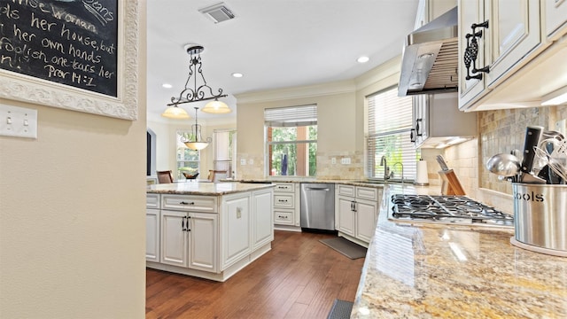 37703 Edgewater Dr, Pinehurst, TX 77362 - kitchen with stainless steel appliances, ventilation hood, tasteful backsplash, ornamental molding, and dark wood-style flooring