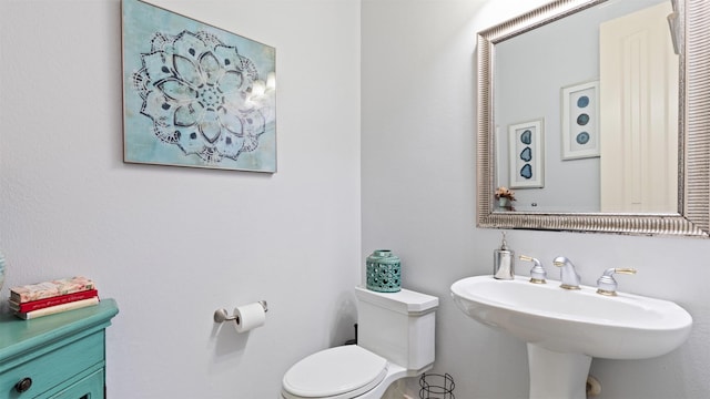 37703 Edgewater Dr, Pinehurst, TX 77362 - bathroom with toilet and a sink