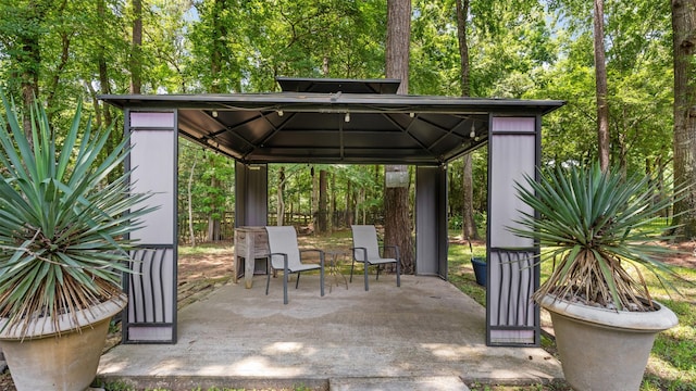 37703 Edgewater Dr, Pinehurst, TX 77362 - view of patio / terrace featuring a gazebo