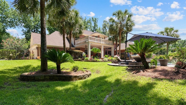 37703 Edgewater Dr, Pinehurst, TX 77362 - view of yard with a balcony