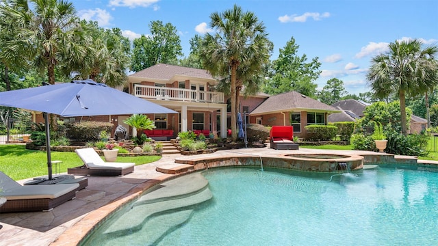 37703 Edgewater Dr, Pinehurst, TX 77362 - view of swimming pool with a patio and a pool with connected hot tub