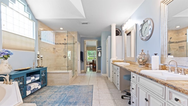 37703 Edgewater Dr, Pinehurst, TX 77362 - full bathroom featuring a stall shower, double vanity, tile patterned flooring, a tub to relax in, and recessed lighting