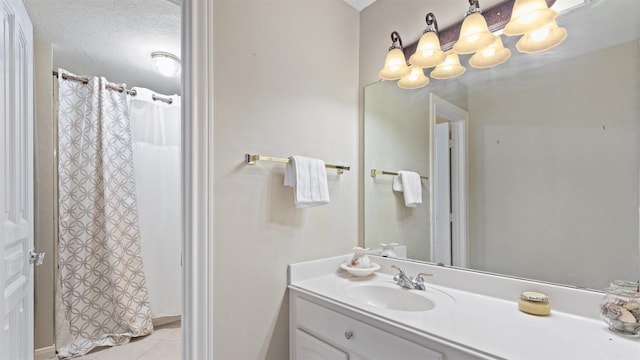 37703 Edgewater Dr, Pinehurst, TX 77362 - bathroom featuring vanity, tile patterned floors, and curtained shower