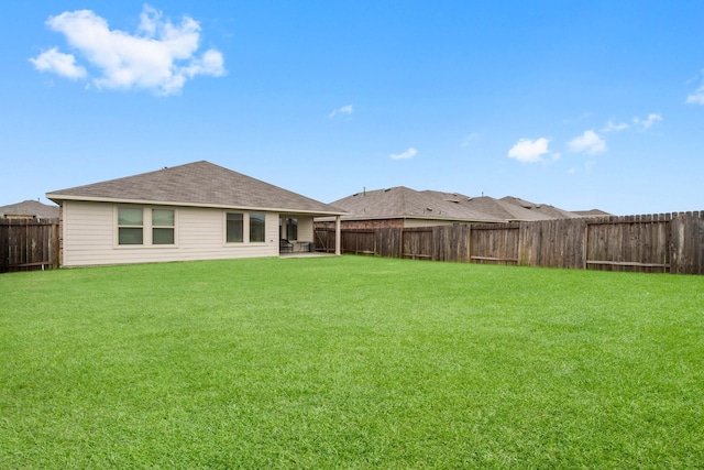 5315 Shady Olive St, Katy, TX 77449 - rear view of house featuring a fenced backyard and roof with shingles
