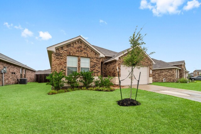 5315 Shady Olive St, Katy, TX 77449 - ranch-style home with concrete driveway, a garage, brick siding, and stone siding