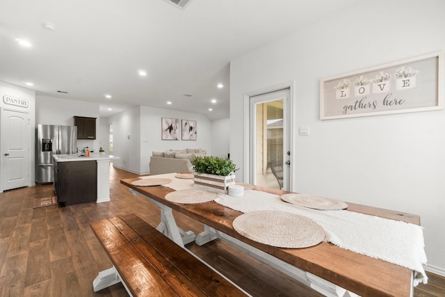 5315 Shady Olive St, Katy, TX 77449 - dining room featuring dark wood-type flooring and recessed lighting