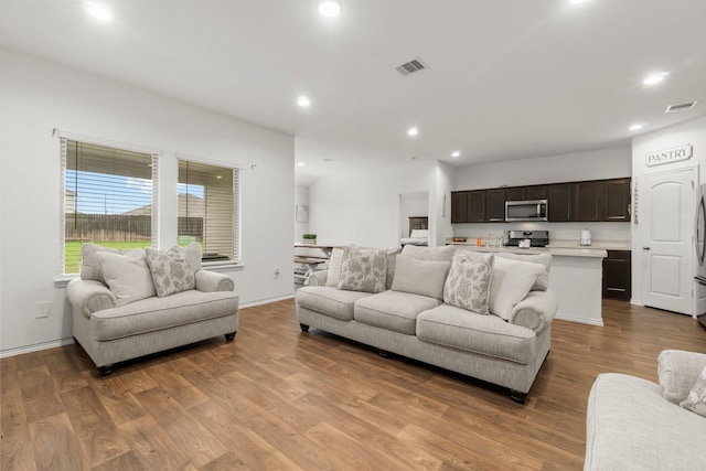 5315 Shady Olive St, Katy, TX 77449 - living area with recessed lighting and wood finished floors