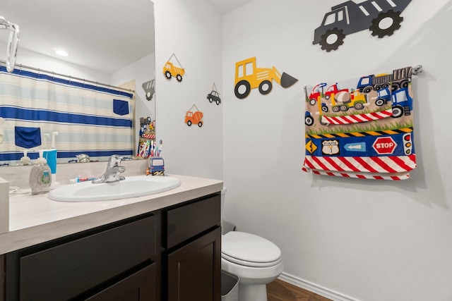 5315 Shady Olive St, Katy, TX 77449 - bathroom with vanity, wood finished floors, and curtained shower