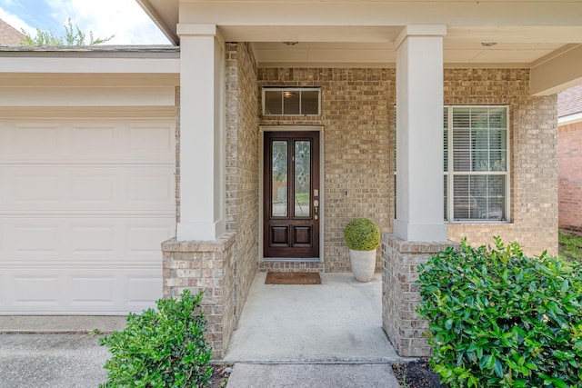 2954 Smokey Forest Ln, Spring, TX 77386 - entrance to property featuring an attached garage, covered porch, and brick siding
