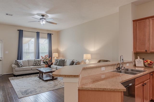2954 Smokey Forest Ln, Spring, TX 77386 - kitchen featuring a peninsula, open floor plan, dishwashing machine, light countertops, and dark wood-style floors