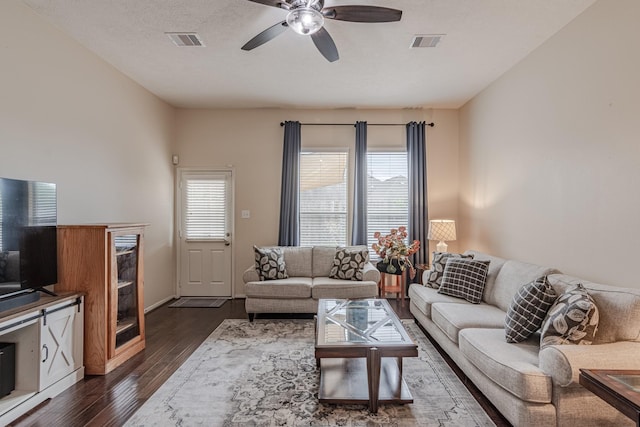 2954 Smokey Forest Ln, Spring, TX 77386 - living room with a ceiling fan and dark wood-style floors