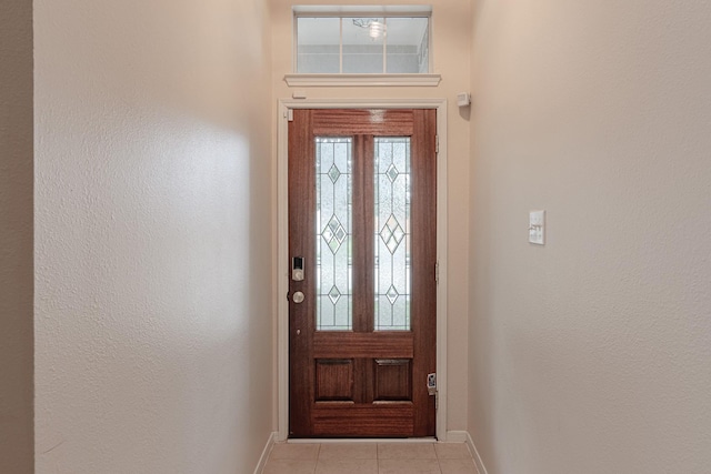 2954 Smokey Forest Ln, Spring, TX 77386 - entryway with baseboards and light tile patterned floors