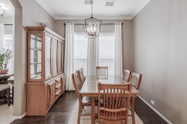 2954 Smokey Forest Ln, Spring, TX 77386 - dining room with a chandelier, ornamental molding, dark wood-style floors, and arched walkways