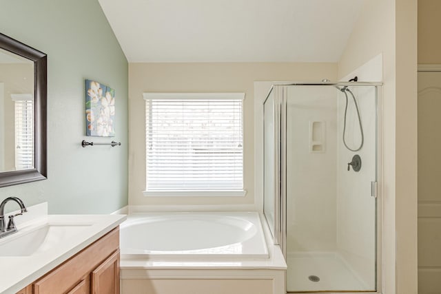 2954 Smokey Forest Ln, Spring, TX 77386 - bathroom featuring vanity, a stall shower, plenty of natural light, and lofted ceiling