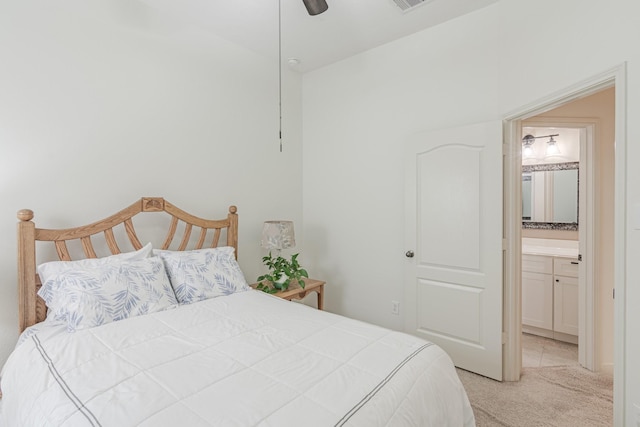 2954 Smokey Forest Ln, Spring, TX 77386 - bedroom with carpet floors, ensuite bathroom, and a ceiling fan