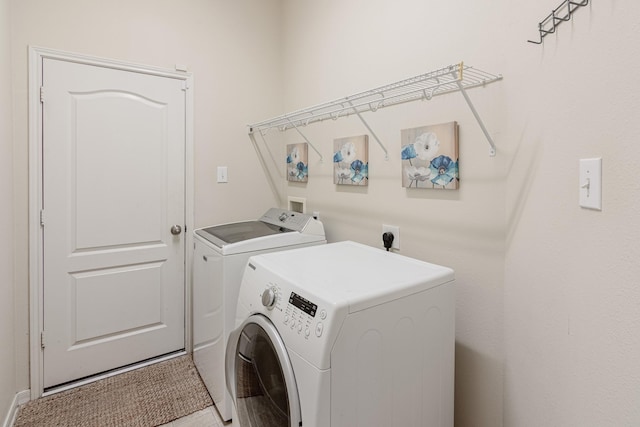 2954 Smokey Forest Ln, Spring, TX 77386 - laundry room featuring independent washer and dryer