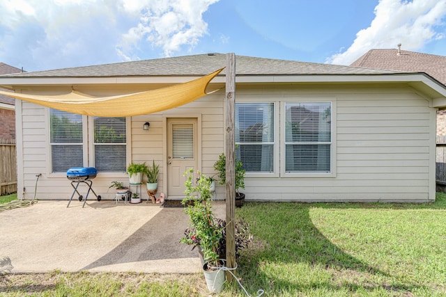 2954 Smokey Forest Ln, Spring, TX 77386 - entrance to property with a patio, a yard, and a shingled roof